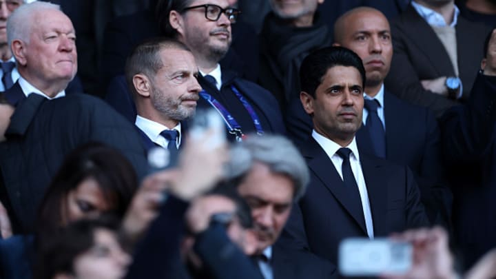Nasser Al-Khelaifi y Aleksander Ceferin en un partido de Champions League.