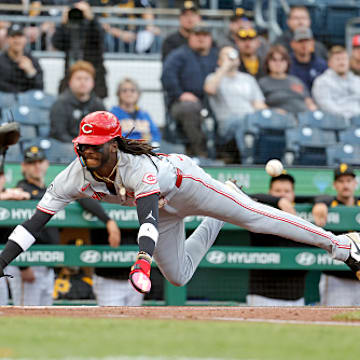 Elly De La Cruz flies safely into home against the Pittsburgh Pirates. 