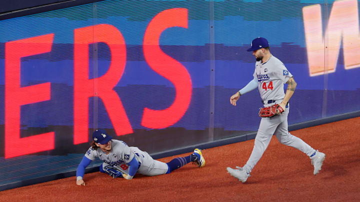 Dodgers' Kiké Hernández reacts to his collision with Andy Pages on a game-saving play in the ninth inning of Game 7's win in the World Series. Dodgers' Kiké Hernández reacts to his collision with Andy Pages on a game-saving play in the ninth inning of Game 7's win in the World Series.