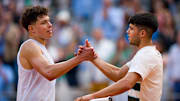 Ben Shelton and Carlos Alcaraz shake hands after a French Open match.