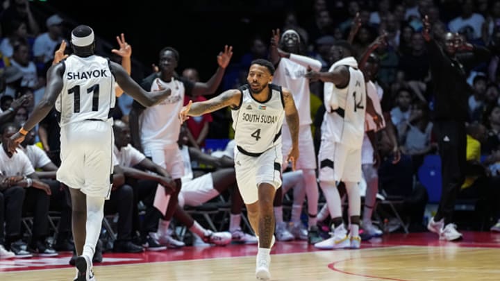 Carlik Jones #4 of South Sudan celebrates a three during the game against Team USA as part of the 2024 USA Basketball Showcase on July 20, 2024 in London, England at O2 Arena.