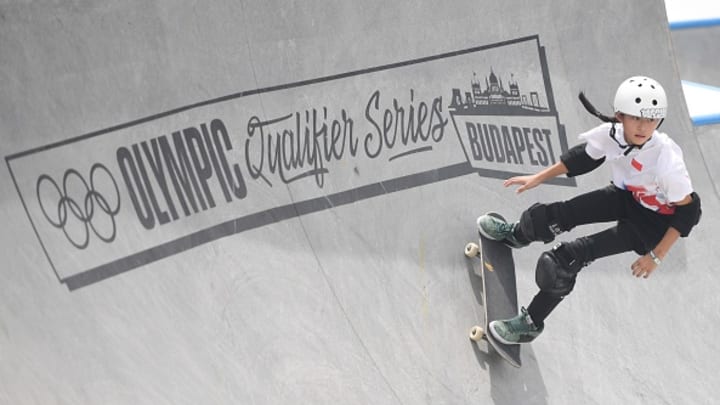 11-year-old Zheng Haohao from China participating in an Olympic skateboarding qualifying event in Budapest. 