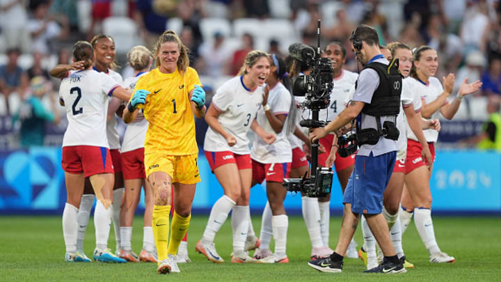 Alyssa Naeher #1 of the United States celebrates after defeating Germany during the Women's semifinal match during the Olympic Games Paris 2024 at Stade de Lyon on August 06, 2024 in Lyon, France. 