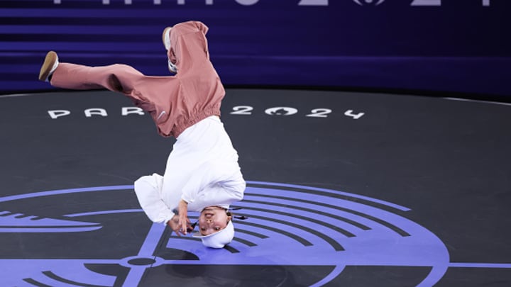 B-Girl Ami of Team Japan competes with B-Girl India of Team Netherlands (not pictured) during the Breaking B-Girls Quarterfinal 1 battle on day fourteen of the Olympic Games Paris 2024 at Place de la Concorde on August 09, 2024 in Paris, France