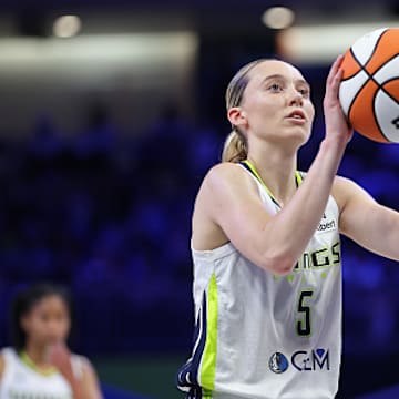 Paige Bueckers #5 of the Dallas Wings shoots a free throw during the game against the Seattle Storm on May 19, 2024 at the College Park Center in Arlington, TX.