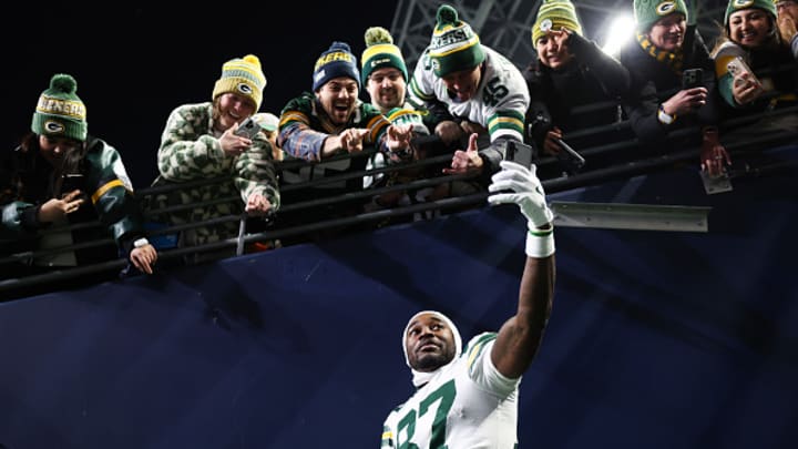 Packers WR Romeo Doubs takes a selfie with Packers fans in Seattle Packers WR Romeo Doubs takes a selfie with Packers fans in Seattle