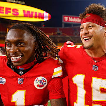 Xavier Worthy #1 and Quarterback Patrick Mahomes #15 of the Kansas City Chiefs celebrate their 27-20 win over the Baltimore Ravens at Arrowhead Stadium on September 05, 2024 in Kansas City, Missouri. 