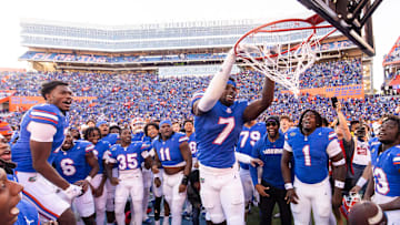 Florida Gators tight end Amir Jackson (7) slam dunks the football ball at Ben Hill Griffin Stadium in Gainesville, FL on Saturday, November 23, 2024 after the Florida Gators defeated the Rebels 24-17 [Doug Engle/Gainesville Sun]