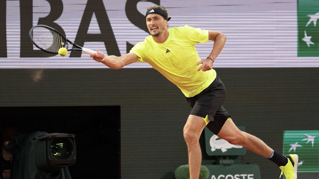 Jun 4, 2025; Paris, FR; Alexander Zverev of Germany returns a shot during his match against Novak Djokovic of Serbia on day 11 at Roland Garros Stadium.  Mandatory Credit: Susan Mullane-Imagn Images