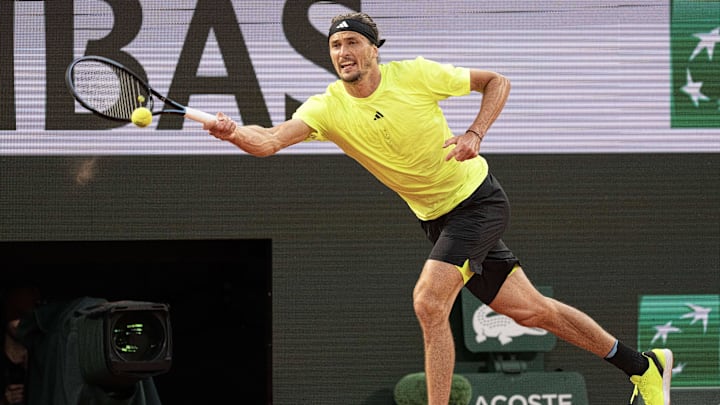 Jun 4, 2025; Paris, FR; Alexander Zverev of Germany returns a shot during his match against Novak Djokovic of Serbia on day 11 at Roland Garros Stadium.  Mandatory Credit: Susan Mullane-Imagn Images