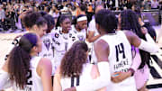 Golden State Valkyries players huddle after the game against the Connecticut Sun.