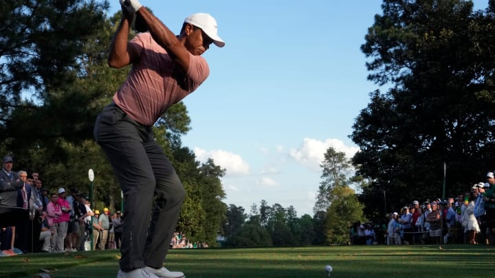 Apr 11, 2024; Augusta, Georgia, USA; Tiger Woods plays his shot from the ninth tee during the first