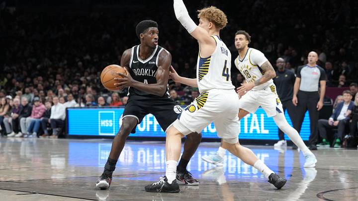Apr 9, 2026; Brooklyn, New York, USA; Brooklyn Nets guard Drake Powell (4) looks to make a move on Indiana Pacers guard Taelon Peter (4) during the first half at Barclays Center. Mandatory Credit: Gregory Fisher-Imagn Images
