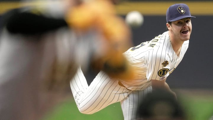 Milwaukee Brewers pitcher Logan Henderson throws during his major-league debut.