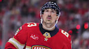 Apr 28, 2025; Sunrise, Florida, USA; Florida Panthers center Brad Marchand (63) looks on against the Tampa Bay Lightning during the second period in game four of the first round of the 2025 Stanley Cup Playoffs at Amerant Bank Arena. Mandatory Credit: Rich Storry-Imagn Images