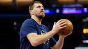Nov 11, 2025; Sacramento, California, USA; Denver Nuggets center Nikola Jokic (15) warms up before the game against the Sacramento Kings at Golden 1 Center. Mandatory Credit: Sergio Estrada-Imagn Images