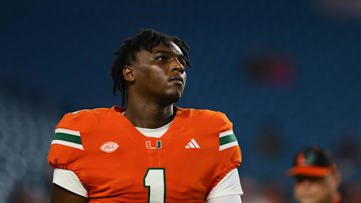 Sep 27, 2024; Miami Gardens, Florida, USA; Miami Hurricanes quarterback Cam Ward (1) looks on from the field before the game against the Virginia Tech Hokies at Hard Rock Stadium. Mandatory Credit: Sam Navarro-Imagn Images