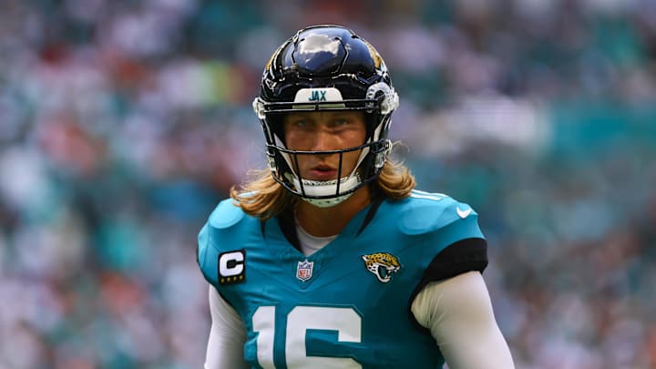 Sep 8, 2024; Miami Gardens, Florida, USA; Jacksonville Jaguars quarterback Trevor Lawrence (16) looks on against the Miami Dolphins during the first quarter at Hard Rock Stadium. Mandatory Credit: Sam Navarro-Imagn Images