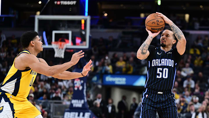 Orlando Magic guard Cole Anthony shoots the ball over Indiana Pacers guard RayJ Dennis. Orlando Magic guard Cole Anthony shoots the ball over Indiana Pacers guard RayJ Dennis.