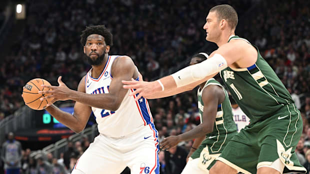 Joel Embiid competing against the Bucks. 