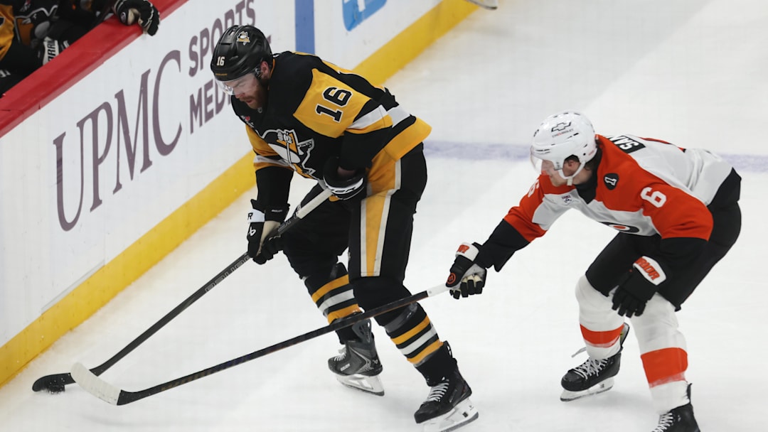 Mar 7, 2026; Pittsburgh, Pennsylvania, USA;  Pittsburgh Penguins right wing Justin Brazeau (16) handles the puck against Philadelphia Flyers defenseman Travis Sanheim (6) during the second period at PPG Paints Arena. Mandatory Credit: Charles LeClaire-Imagn Images