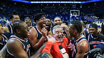 Auburn head coach Bruce Pearl and his No.1 Tigers celebrate after their 94-78 win over Kentucky -- the first win at Rupp Arena since 1988 -- in SEC basketball Saturday afternoon in Lexington, Kentucky March 1, 2025