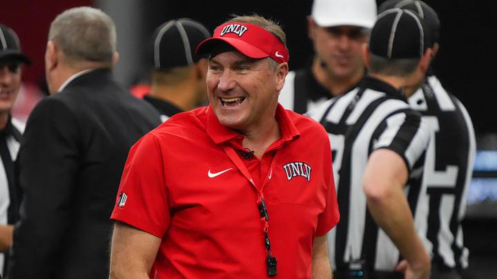 Dec 23, 2025; Frisco, TX, USA;  UNLV Rebels head coach Dan Mullen talk on the field prior to game against the Ohio Bobcats at the Ford Center at The Star. Mandatory Credit: Raymond Carlin III-Imagn Images