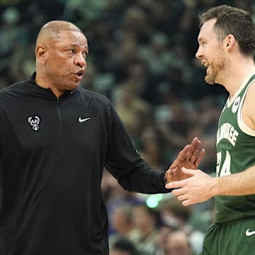  Milwaukee Bucks head coach Doc Rivers talks with guard Pat Connaughton (24) during the second quarter against the Indiana Pacers during game five of the first round for the 2024 NBA playoffs at Fiserv Forum. 