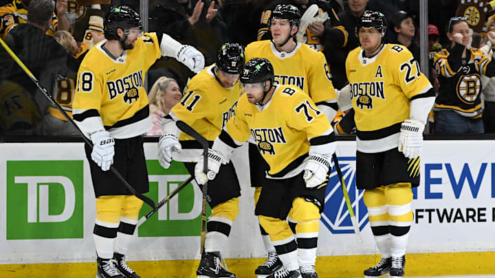 Mar 7, 2026; Boston, Massachusetts, USA; Boston Bruins left wing Viktor Arvidsson (71) celebrates with his teammates after coring a goal against the Washington Capitals during the third period at the TD Garden. Mandatory Credit: Brian Fluharty-Imagn Images