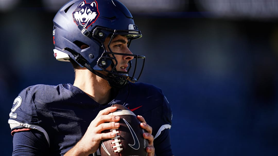 Nov 1, 2025; East Hartford, Connecticut, USA; UConn Huskies quarterback Joe Fagnano (2) warms up before the start of the game against the UAB Blazers at Pratt & Whitney Stadium at Rentschler Field. Mandatory Credit: David Butler II-Imagn Images