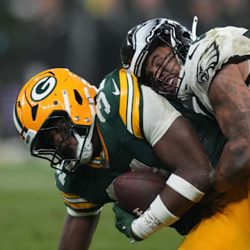 Sep 6, 2024; Sao Paulo, BRA; Philadelphia Eagles linebacker Zack Baun (53) tackles Green Bay Packers running back Emanuel Wilson (31) during the second half at Neo Quimica Arena. 