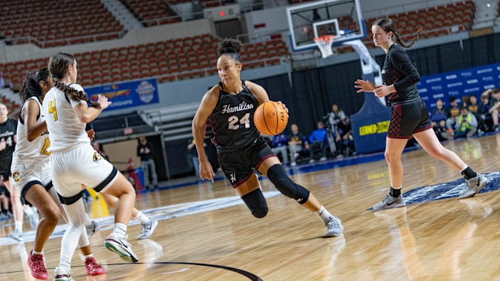Hamilton Huskies Sage Henry (24) runs with the ball against the Gilbert Tigers during the AIA 6A State Championship at the Arizona Veterans Memorial Coliseum in Phoenix on March 8, 2025.