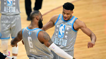 Team LeBron forward LeBron James celebrates after making the game-winning shot with forward Giannis Antetokounmpo.