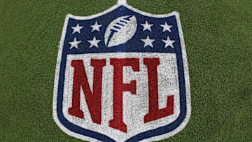 General view of the NFL shield logo on the field at the Tom Benson Hall of Fame Stadium site of the Professional Football Hall of Fame game and Class of 2025 induction ceremonies. 