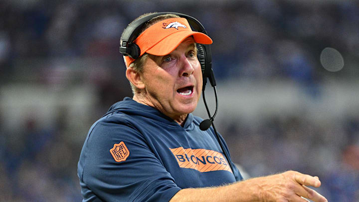 Aug 11, 2024; Indianapolis, Indiana, USA; Denver Broncos Head Coach Sean Payton shares a word with a referee during the second half against the Indianapolis Colts  at Lucas Oil Stadium. Mandatory Credit: Marc Lebryk-Imagn Images