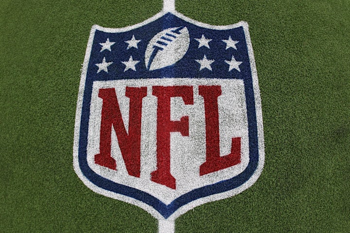 General view of the NFL shield logo on the field at the Tom Benson Hall of Fame Stadium 