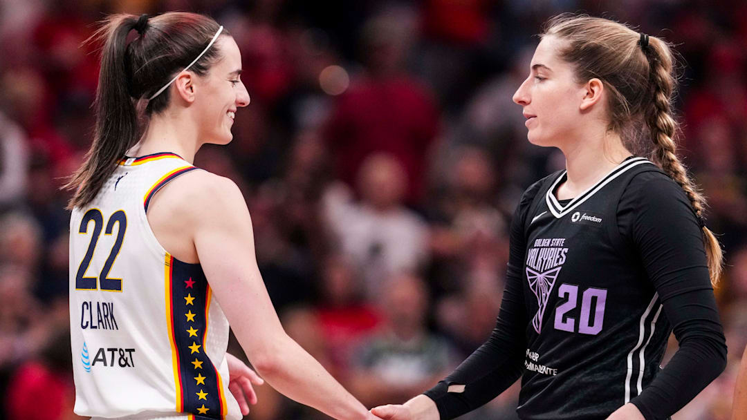 Indiana Fever guard Caitlin Clark (22) greets Golden State Valkyries guard Kate Martin (20) on Wednesday, July 9, 2025, during a game between the Indiana Fever and the Golden State Valkyries at Gainbridge Fieldhouse in Indianapolis.