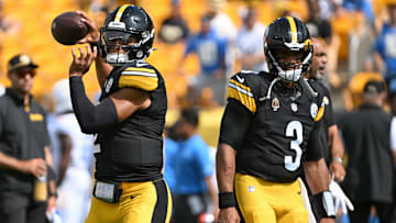 Sep 22, 2024; Pittsburgh, Pennsylvania, USA; Pittsburgh Steelers quarterback Justin Fields (2) warms up next to quarterback Russell Wilson (3) before a game against the Los Angeles Chargers at Acrisure Stadium. Mandatory Credit: Barry Reeger-Imagn Images