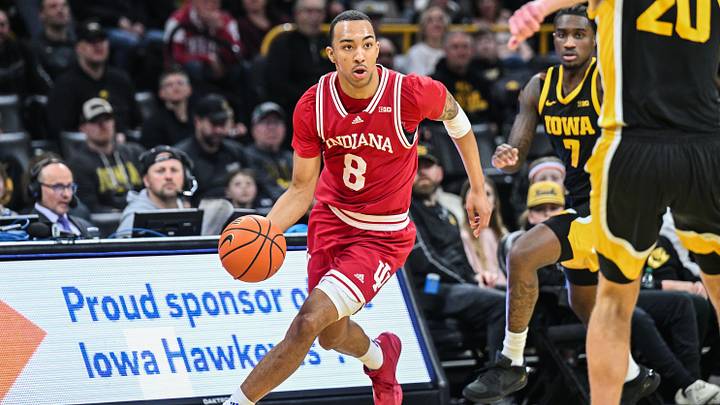 Jan 11, 2025; Iowa City, Iowa, USA; Indiana Hoosiers forward Bryson Tucker (8) brings the ball up court against the Iowa Hawkeyes during the first half at Carver-Hawkeye Arena. Mandatory Credit: Jeffrey Becker-Imagn Images