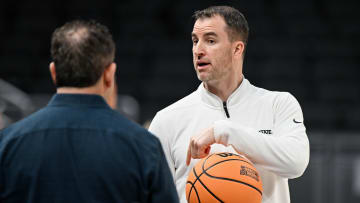 Danny Sprinkle holds court during an NCAA tournament practice. 