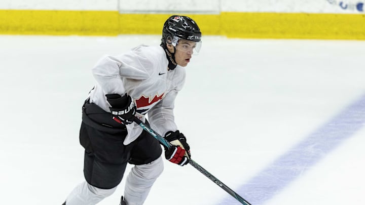 Aug 2, 2024; Plymouth, MI, USA; Canada forward Tij Iginla (14) skates up ice with the puck against Finland during the 2024 World Junior Summer Showcase at USA Hockey Arena. Mandatory Credit: David Reginek-Imagn Images Aug 2, 2024; Plymouth, MI, USA; Canada forward Tij Iginla (14) skates up ice with the puck against Finland during the 2024 World Junior Summer Showcase at USA Hockey Arena. Mandatory Credit: David Reginek-Imagn Images