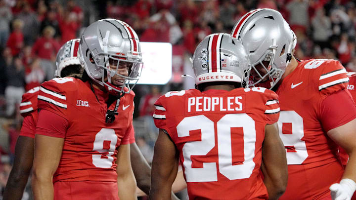 Sept. 7, 2024; Columbus, Ohio, USA;
Ohio State Buckeyes running back James Peoples (20) celebrates with teammates after scoring a touchdown during the second half of an NCAA Division I football game against the Western Michigan Broncos on Saturday at Ohio Stadium.