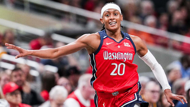 Brittney Sykes celebrates a bucket