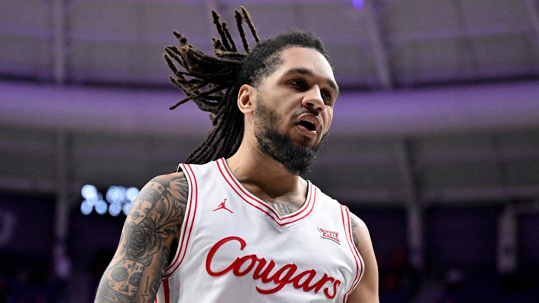 Jan 28, 2026; Fort Worth, Texas, USA; Houston Cougars guard Emanuel Sharp (21) celebrates after he makes a jump shot against the TCU Horned Frogs during the second half at Ed and Rae Schollmaier Arena. Mandatory Credit: Jerome Miron-Imagn Images Jan 28, 2026; Fort Worth, Texas, USA; Houston Cougars guard Emanuel Sharp (21) celebrates after he makes a jump shot against the TCU Horned Frogs during the second half at Ed and Rae Schollmaier Arena. Mandatory Credit: Jerome Miron-Imagn Images