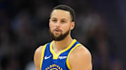 Golden State Warriors guard Stephen Curry (30) looks on against the Phoenix Suns in the second quarter at Chase Center.