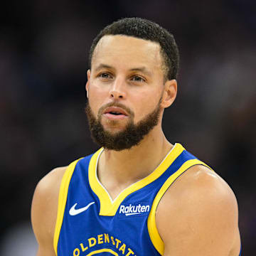 Golden State Warriors guard Stephen Curry (30) looks on against the Phoenix Suns in the second quarter at Chase Center.