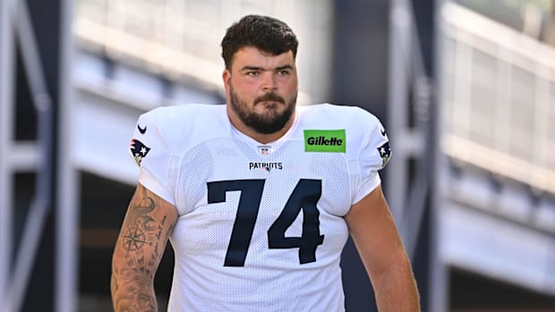 New England Patriots offensive lineman Jack Conley (74) heads to the practice fields.