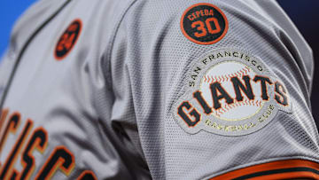 Aug 2, 2024; Cincinnati, Ohio, USA; A detail view of the San Francisco Giants logo on the sleeve of outfielder Michael Conforto (8) in the third inning in the game against the Cincinnati Reds at Great American Ball Park. 