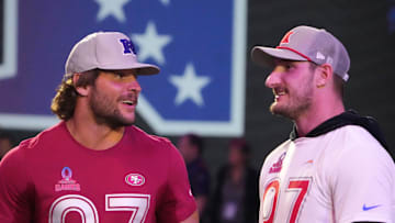 NFC defensive end Nick Bosa (left) with brother and AFC linebacker Joey Bosa (right)