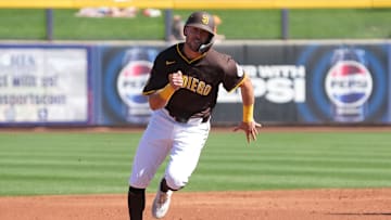 Feb 25, 2025; Peoria, Arizona, USA; San Diego Padres outfielder Brandon Lockridge (28) runs to third base against the Los Angeles Angels during the second inning at Peoria Sports Complex. Mandatory Credit: Rick Scuteri-Imagn Images